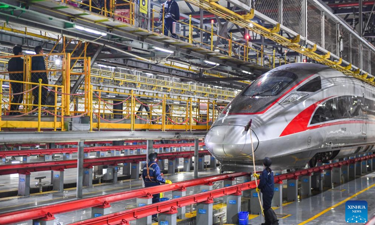 This photo taken on Jan. 25, 2024 shows a bullet train maintenance base in Wuhan, central China's Hubei Province. In recent years, provinces in China's central region have been striving to construct modernized transportation system based on geographical advantage, industrial foundation and resource endowment. (Xinhua/Du Zixuan)

