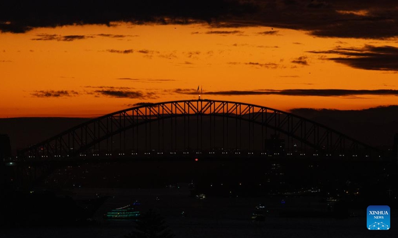 This photo taken on June 9, 2024 shows sunset view of Harbor Bridge in Sydney, Australia. (Photo: Xinhua)