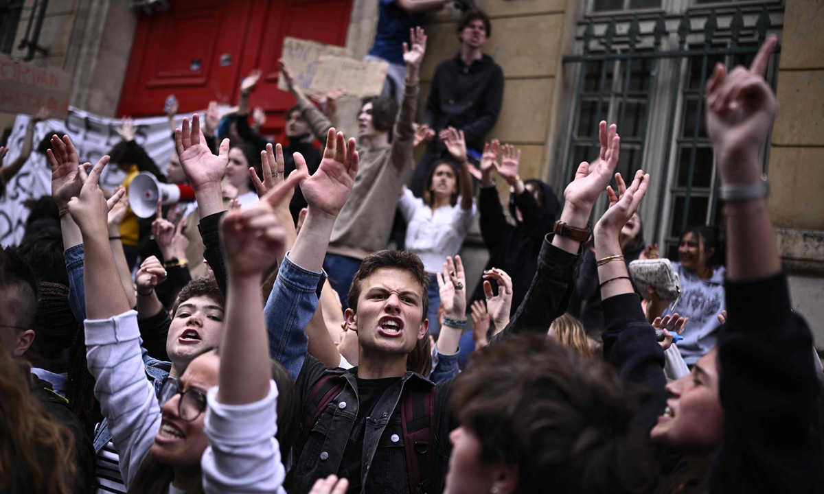 Students shout during a demonstration to protest against the rise of far-right parties in front of the Henri IV high school in Paris on June 10, 2024, a day after the European Parliament elections. Photo: AFP
