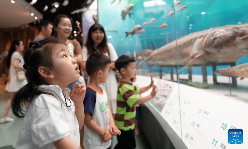 Children visit Chongqing Natural History Museum in southwest China's Chongqing Municipality, June 9, 2024. People enjoy the 3-day holiday of the Dragon Boat Festival, also called Duanwu Festival, which falls on June 10 this year, via various activities across the country. (Photo: Xinhua)