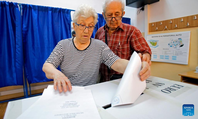 People vote for the European Parliament elections and local elections at a polling station in Bucharest, Romania, June 9, 2024. (Photo: Xinhua)