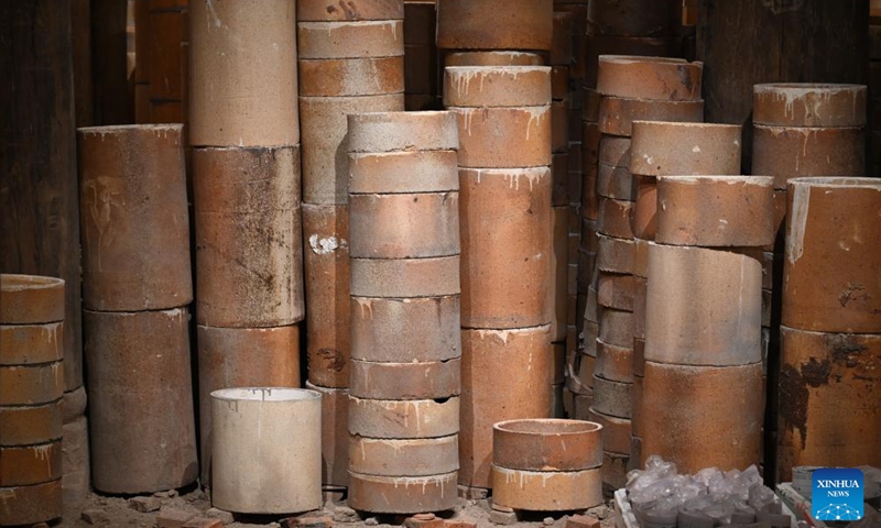 This photo shows piles of saggers, essential tools in the ceramic firing process, at a kiln in Jingdezhen, east China's Jiangxi Province, June 5, 2024. (Photo: Xinhua)