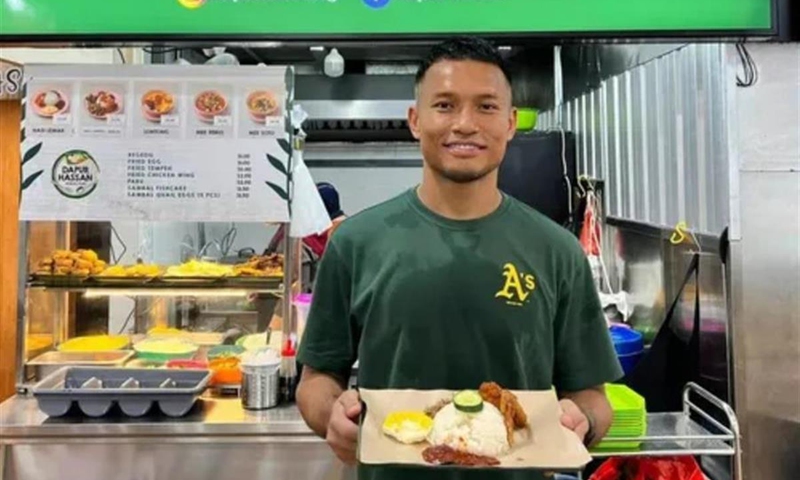 A screen cut of Singaporean goalkeeper Hassan Sunny at his food stall