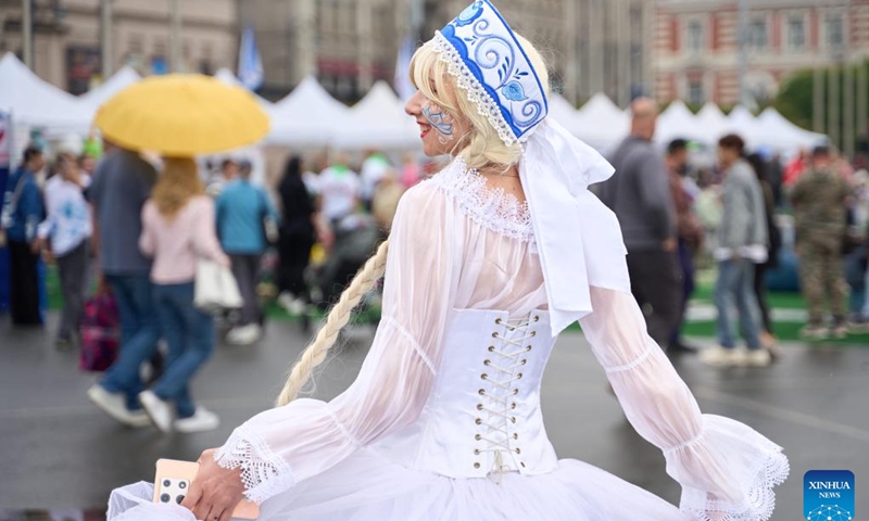 A girl in traditional costume dances during a celebration of the Russia Day in Vladivostok, Russia, June 12, 2024. Russia Day marks the date when the First Congress of People's Deputies of the Russian Federation adopted the Declaration of Russia's National Sovereignty in 1990.(Photo: Xinhua)