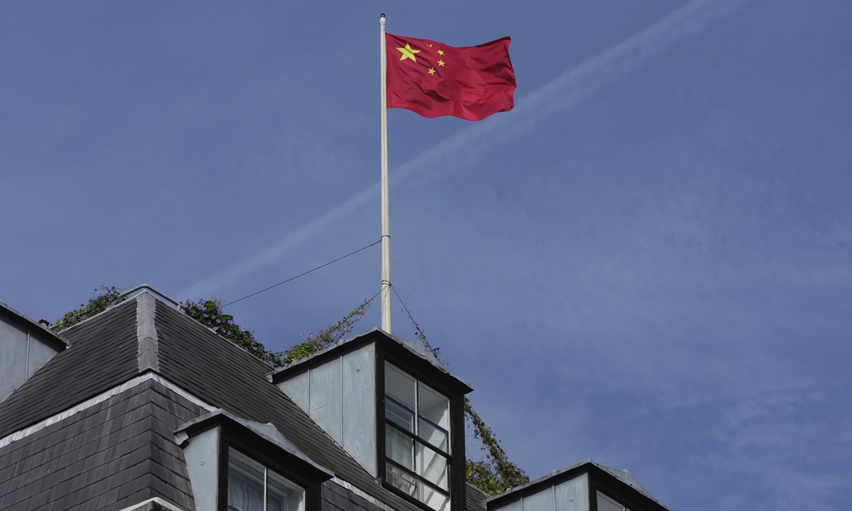 Chinese national flag is raised at the Chinese embassy in London Photo: VCG