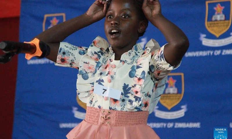 A student sings a song during the 23rd edition of the Chinese Bridge competition at the University of Zimbabwe in Harare, the capital of Zimbabwe, June 14, 2024. Chinese language students in Zimbabwe on Friday showcased their language competence at the 23rd edition of the Chinese Bridge competition held at the University of Zimbabwe in Harare, the capital of Zimbabwe. (Photo by Tafara Mugwara/Xinhua)