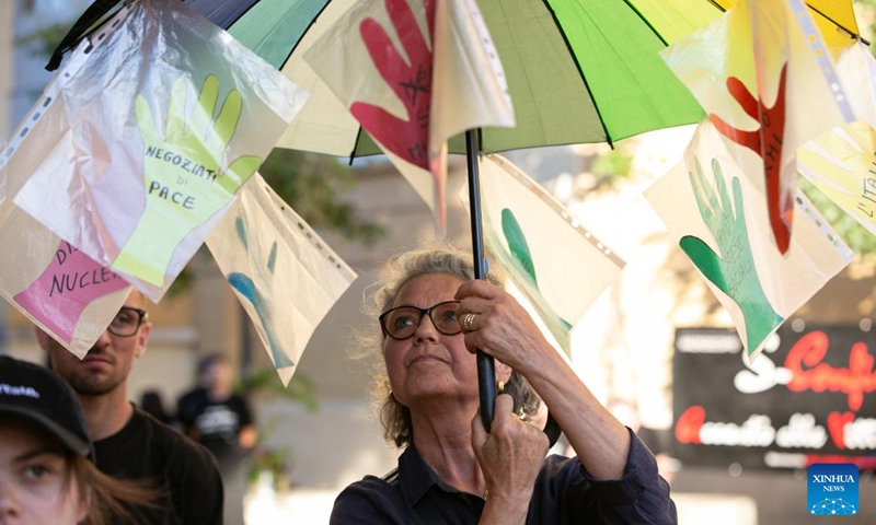 A woman protests during an anti-G7 manifestation at Fasano, Apulia in southern Italy, June 14, 2024. (Photo: Xinhua)