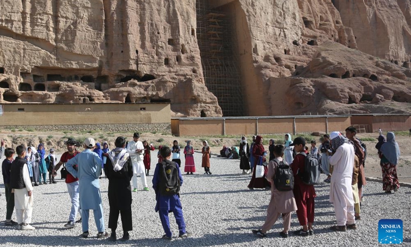 This photo taken on June 16, 2024 shows an outdoor class aimed at promoting cultural relics protection for Afghan primary school students in Bamiyan Province, central Afghanistan. (Photo: Xinhua)