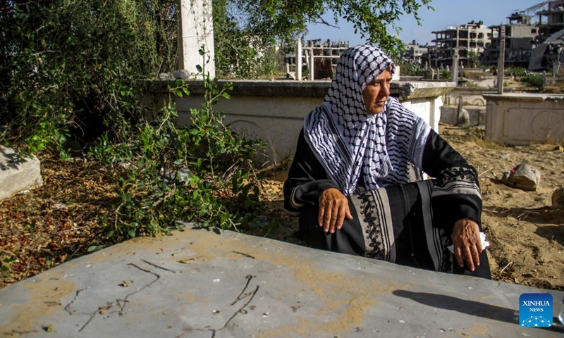 A Palestinian visits a cemetery in Jabalia refugee camp in the northern Gaza Strip on the first day of Eid al-Adha, on June 16, 2024.  (Photo: Xinhua)