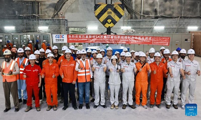 Chinese and Pakistani engineers celebrate the starting of first unit wet testing of Suki Kinari Hydropower Project in Mansehra district of Khyber Pakhtunkhwa province, Pakistan, June 16, 2024. The first unit of the China-built Suki Kinari Hydropower project in northwest Pakistan was started up and formally entered the wet testing phase on Sunday. (Photo: Xinhua)