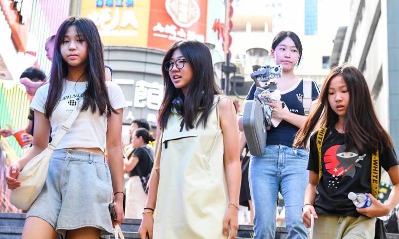 Tourists from Indonesia visit Jiefangbei, a core business area in southwest China's Chongqing, July 17, 2024.

Chongqing is soaring as a favored entry point for foreign tourists. This municipality has received more than 510,000 inbound foreign visitors in the first half of this year. (Xinhua/Wang Quanchao)