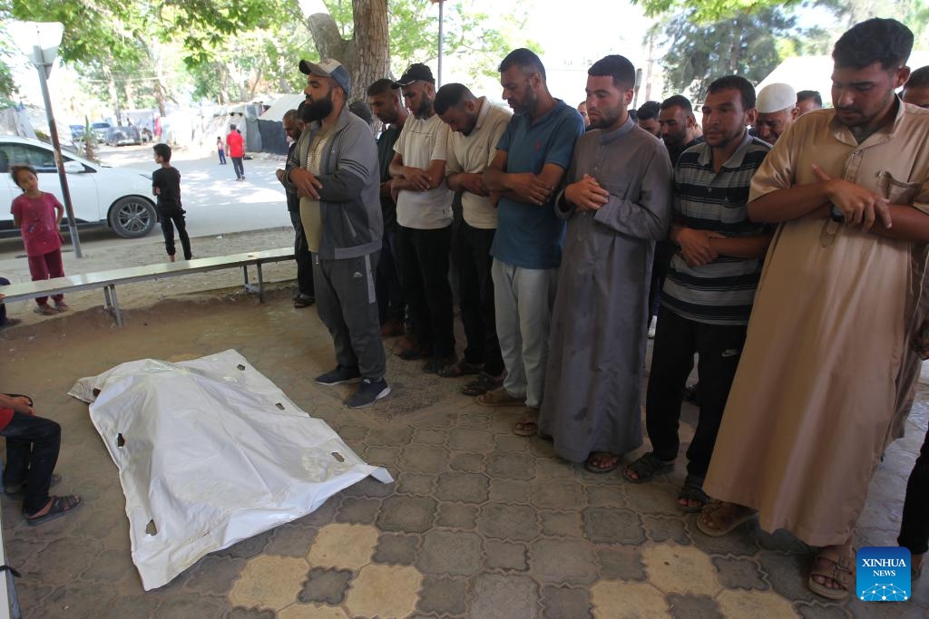 People grieve during the mourning of victims at a hospital in the southern Gaza Strip city of Khan Younis, on June 18, 2024.(Photo: Xinhua) 