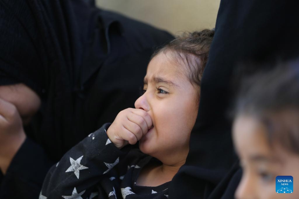 A girl grieves during the mourning of victims at a hospital in the southern Gaza Strip city of Khan Younis, on June 18, 2024.(Photo: Xinhua) 