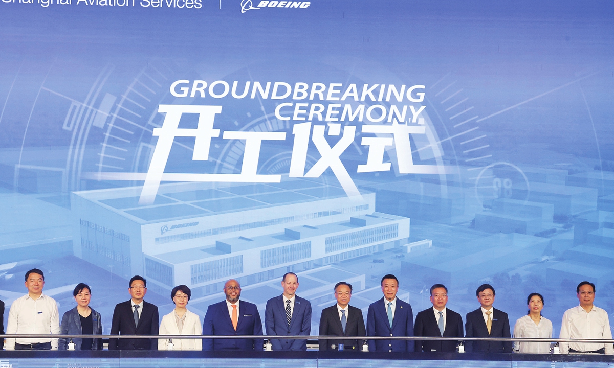 Guests pose for a photo at a groundbreaking ceremony for new hangars of Boeing Shanghai Aviation Services on June 20, 2024. With an investment of 850 million yuan ($117 million), the project, scheduled to be completed in 2025, will be built into a service platform that integrates engineering technical support, aircraft bonded maintenance and modification. Photo: cnsphoto