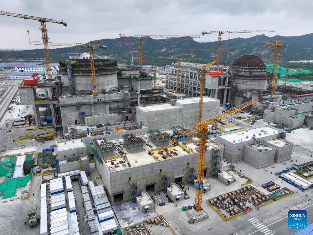 A drone photo shows a construction site of the Tianwan Nuclear Power Station Unit 7 and Unit 8 in Lianyungang, east China's Jiangsu Province, June 19, 2024. Unit 7, as well as Unit 8, has a capacity of 1.265 million kilowatts. And once completed, the two units are estimated to generate about 18.8 billion kilowatt-hours of electricity every year. Started on May 19, 2021, the construction of these two units has gone smoothly.(Photo: Xinhua)