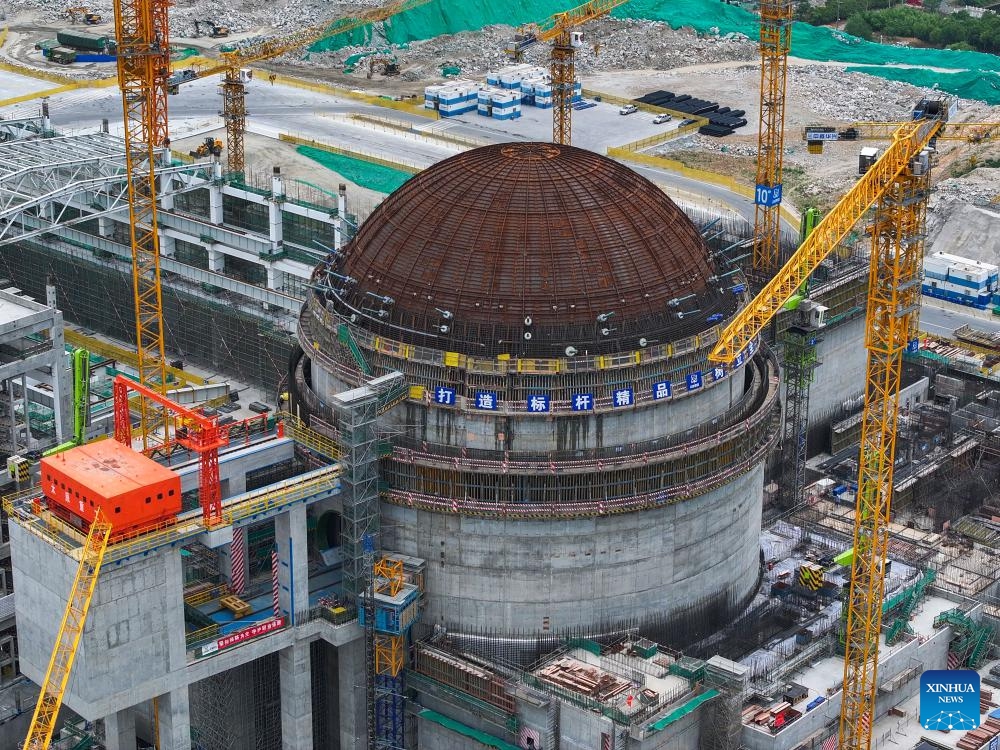 A drone photo shows the Tianwan Nuclear Power Station Unit 8 under construction in Lianyungang, east China's Jiangsu Province, June 19, 2024. Unit 7, as well as Unit 8, has a capacity of 1.265 million kilowatts. And once completed, the two units are estimated to generate about 18.8 billion kilowatt-hours of electricity every year. Started on May 19, 2021, the construction of these two units has gone smoothly.(Photo: Xinhua)