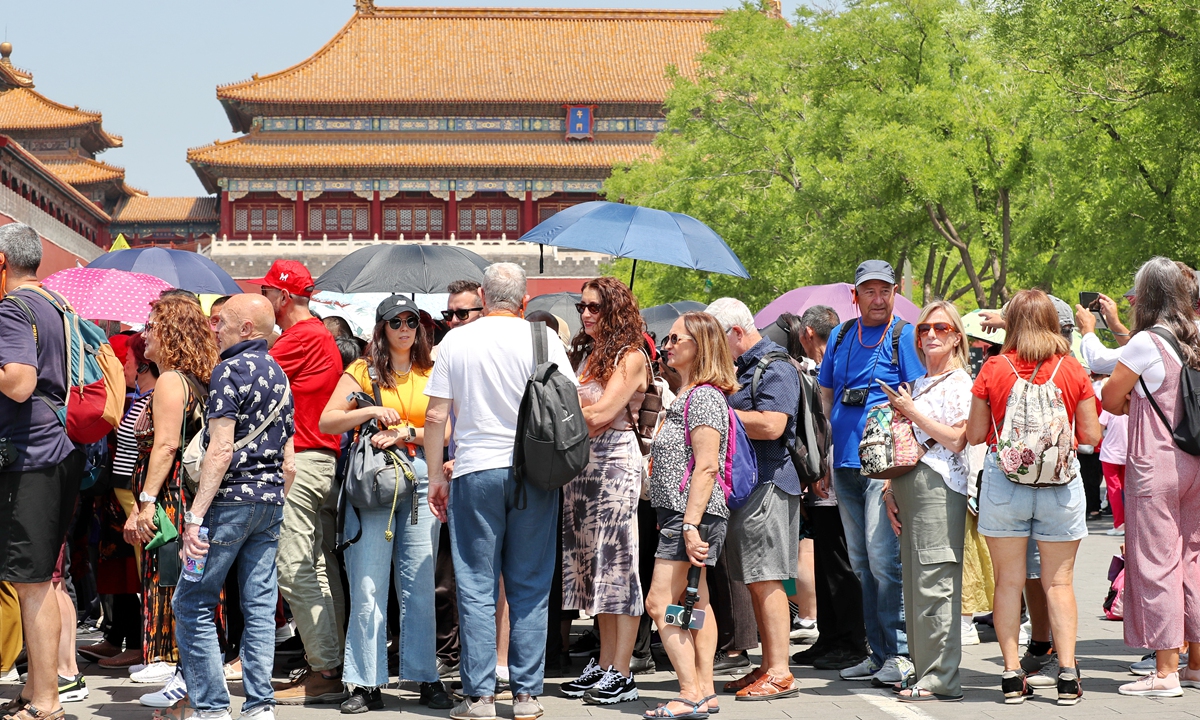 Foreign tourists wait in line at the Palace Museum in Beijing on May 21,2024. Photo: VCG