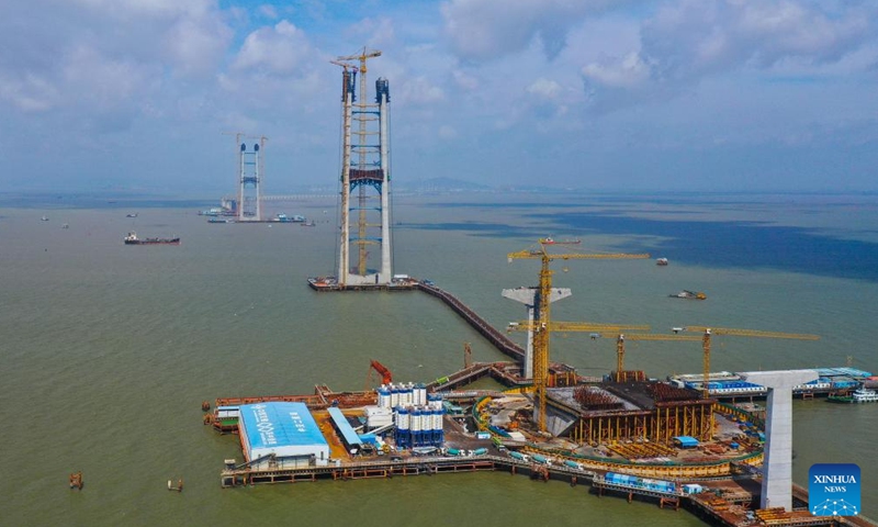 An aerial drone photo taken on July 1, 2021 shows the east anchorage of the Shenzhong Bridge of the Shenzhen-Zhongshan link under construction in south China's Guangdong Province.