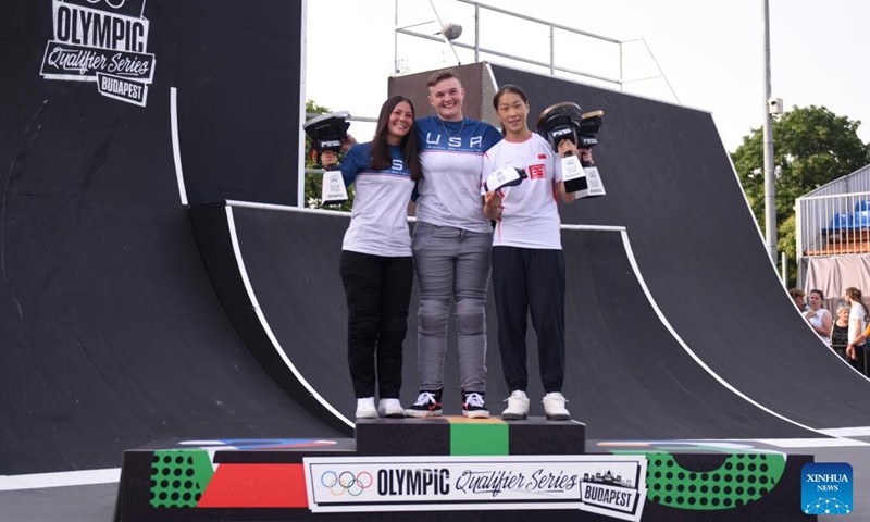 Gold medalist Hannah Roberts (C) of the United States, silver medalist Perris Benegas (L) of the United States and bronze medalist Sun Jiaqi of China pose during the awarding cerenomy after the Cycling BMX Freestyle Women's Park final at the Olympic Qualifier Series Budapest in Budapest, Hungary, June 22, 2024. (Photo: Xinhua)