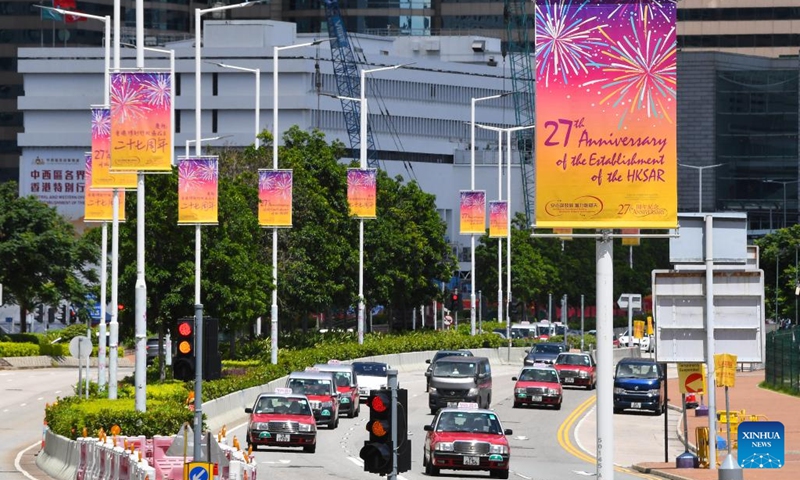 Posters on the 27th anniversary of the establishment of the Hong Kong Special Administrative Region are seen in Hong Kong, south China, June 23, 2024. This year marks the 27th anniversary of Hong Kong's return to the motherland.  (Photo: Xinhua)