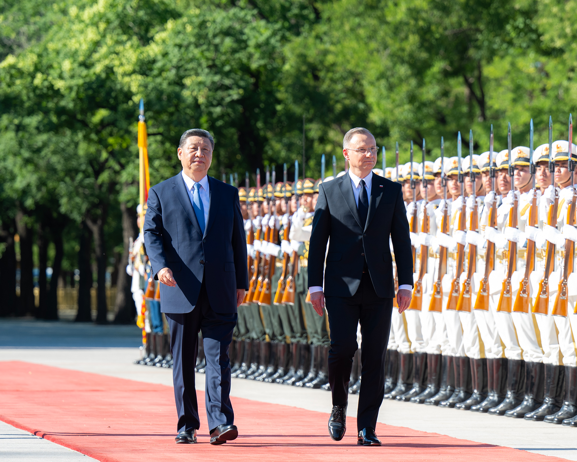 Chinese President Xi Jinping and Polish President Andrzej Duda review the guard of honor in front of the Great Hall of the People in Beijing on June 24, 2024. Photo: Xinhua