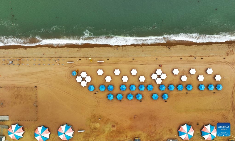 An aerial drone photo taken on June 15, 2024 shows the Jinshitan beach in Dalian, northeast China's Liaoning Province. The 2024 Summer Davos meeting will be held from June 25 to 27 in northeast China's coastal city of Dalian, according to the city's coordination office for Summer Davos.

Also known as the 15th World Economic Forum Annual Meeting of the New Champions, this year's forum will feature the theme Next Frontiers for Growth. (Photo: Xinhua)
