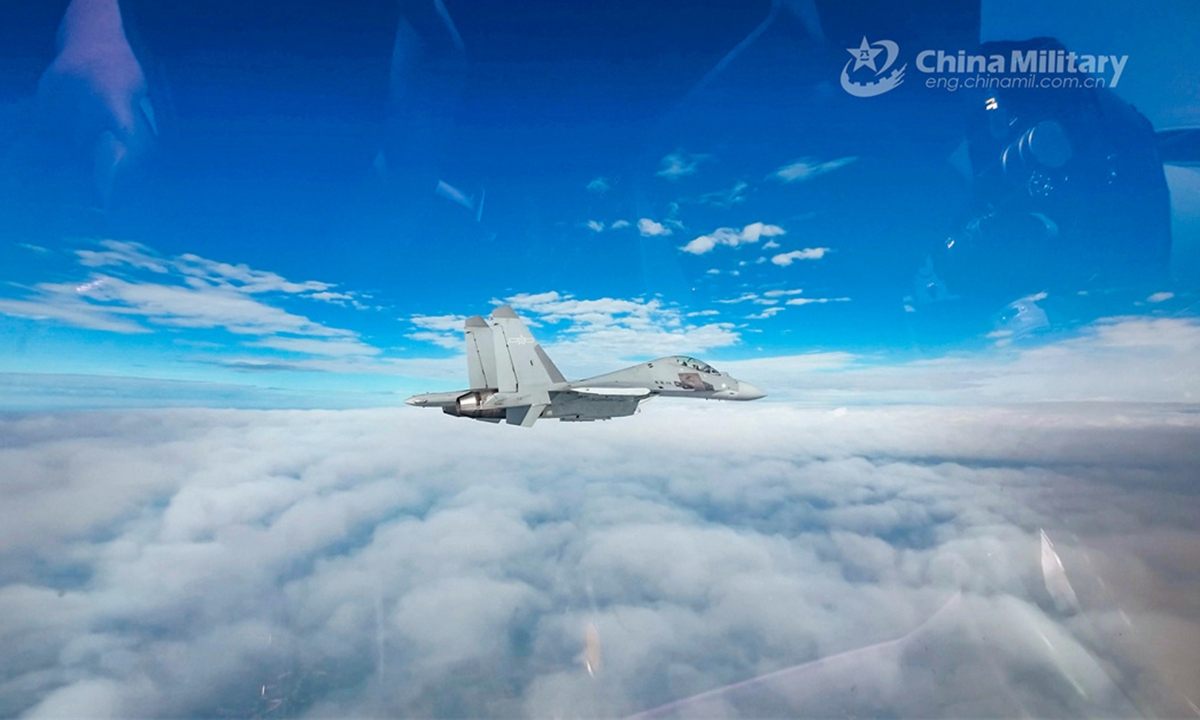 A fighter jet attached to an aviation brigade of the PLA Air Force soars in the sky during a flight training exercise on June 2, 2024. Photo: eng.chinamil.com.cn