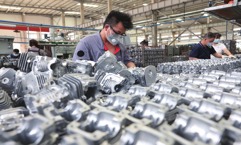 A worker catches up on auto parts orders at a factory in Fuzhou, East China's Fujian Province on June 24, 2024. The local national high-tech industrial development
zone has been implementing supportive policies to bolster the upgrading of conventional manufacturing to intelligent manufacturing.
Photo: VCG