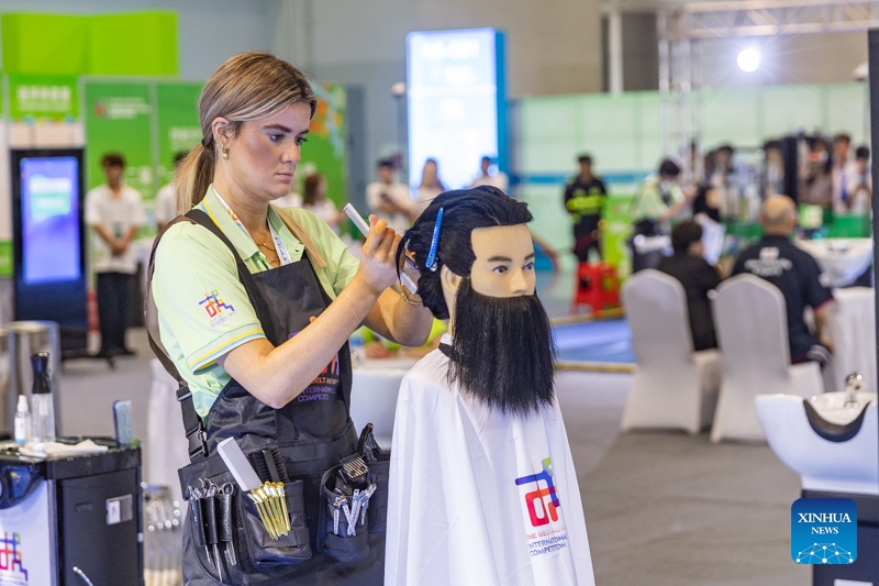 A contestant is pictured during a contest of the second Belt and Road International Skills Competition in southwest China's Chongqing Municipality on June 24, 2024. The second Belt and Road International Skills Competition kicked off at Chongqing International Expo Center here on Monday, attracting participants from 61 countries and regions.(Photo: Xinhua)