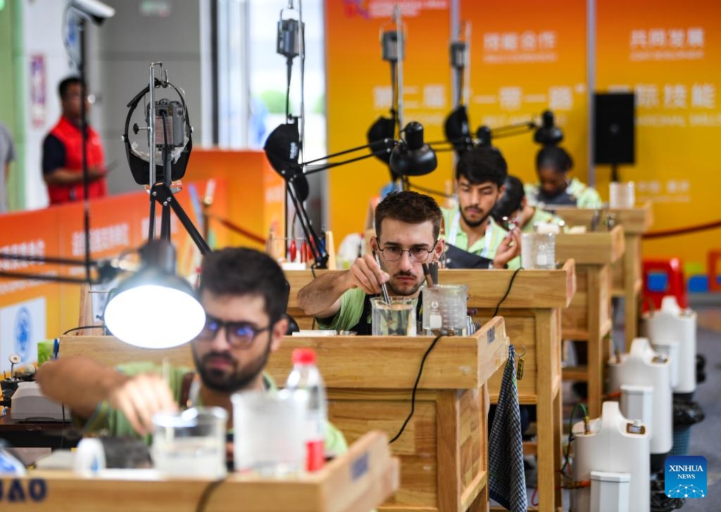 Contestants are pictured during a contest of the second Belt and Road International Skills Competition in southwest China's Chongqing Municipality on June 24, 2024. The second Belt and Road International Skills Competition kicked off at Chongqing International Expo Center here on Monday, attracting participants from 61 countries and regions.(Photo: Xinhua)