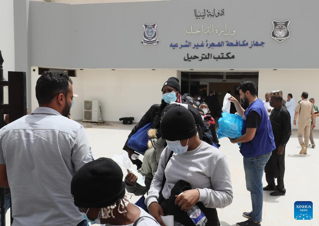 Migrants leave the Deportation Office of the Libyan Illegal Immigration Control Department in Tripoli, Libya, on June 25, 2024. A total of 174 migrants were deported from Libya to Nigeria on Tuesday with the assistance of the International Organization for Migration (IOM), according to a Libyan official.(Photo: Xinhua)