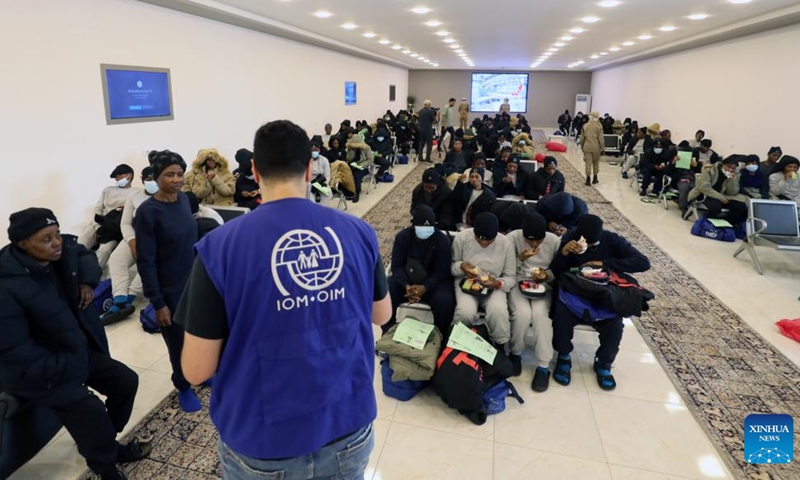 Migrants wait at the Deportation Office of the Libyan Illegal Immigration Control Department in Tripoli, Libya, on June 25, 2024. A total of 174 migrants were deported from Libya to Nigeria on Tuesday with the assistance of the International Organization for Migration (IOM), according to a Libyan official.(Photo: Xinhua)