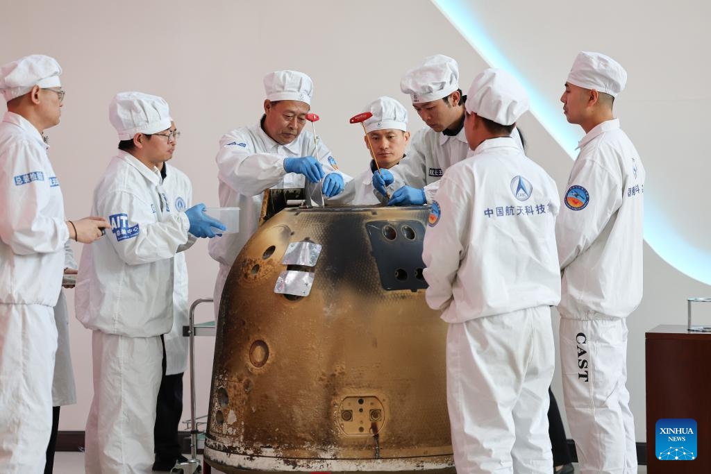 The return ship of the Chang'e-6 lunar probe was opened at a ceremony at the China Academy of Space Technology under the China Aerospace Science and Technology Corporation in Beijing, capital of China, June 26, 2024. The return ship of the Chang'e-6 lunar probe was opened at a ceremony in Beijing on Wednesday afternoon. During the ceremony at the China Academy of Space Technology under the China Aerospace Science and Technology Corporation, researchers opened the return ship and examined key technical indicators. (Xinhua/Xinhua)