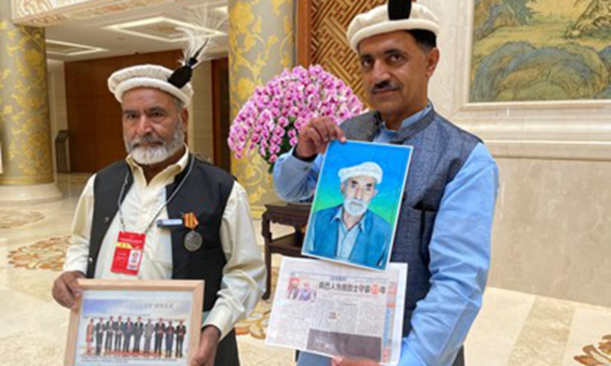 Ahmed Ali (left) and Manzoor Hussain, caretakers of the Gilgit Chinese Memorial Cemetery in Pakistan, attend the commemorative events for the Five Principles of Peaceful Coexistence in Beijing on June 28, 2024. Photo: Liu Xin/GT