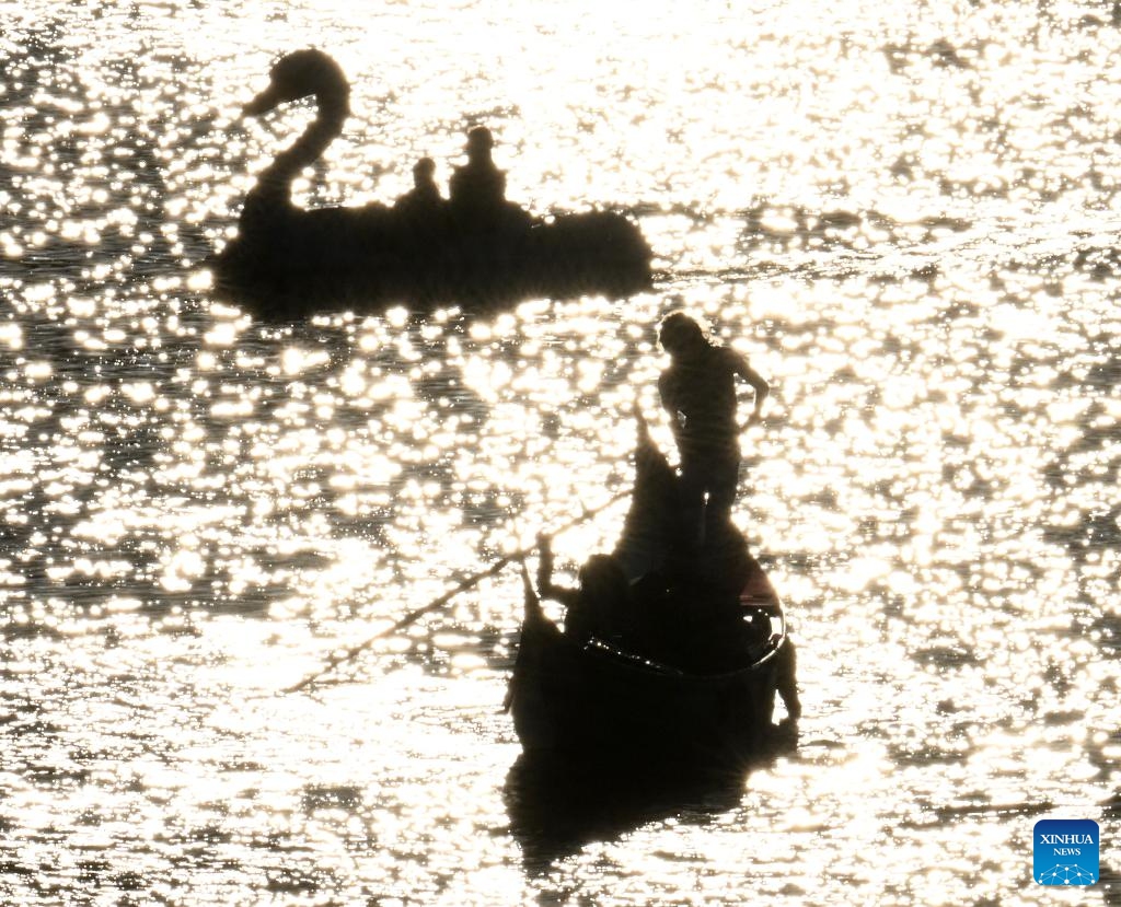 Tourists sail on a gondola, a typical traditional rowing boat of Venice, in Rome, Italy, June 26, 2024. (Photo: Xinhua)