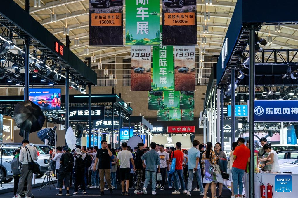 People visit the 25th China Kunming International Automobile Expo in Kunming, southwest China's Yunnan Province, June 27, 2024. The five-day event kicked off at Dianchi International Exhibition Center in Kunming on Thursday, attracting about 100 domestic and international car manufacturers. (Photo: Xinhua)