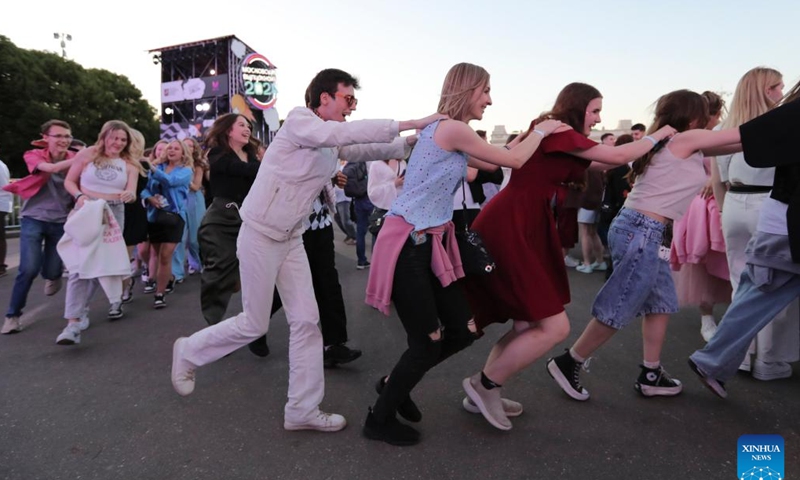 High school graduates take part in a graduation party at Gorky Park in Moscow, Russia, on June 28, 2024. (Photo by Alexander Zemlianichenko Jr/Xinhua)