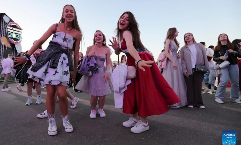 High school graduates take part in a graduation party at Gorky Park in Moscow, Russia, on June 28, 2024. (Photo by Alexander Zemlianichenko Jr/Xinhua)