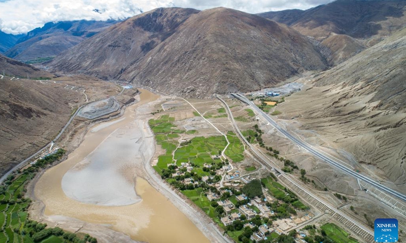 An aerial drone photo taken on June 27, 2024 shows a view of a high-grade highway linking Lhasa and Xigaze in southwest China's Xizang Autonomous Region.