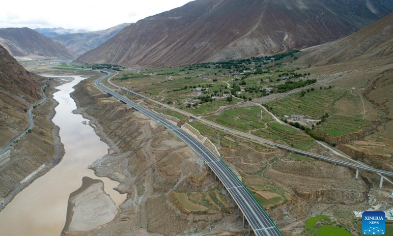 An aerial drone photo taken on June 27, 2024 shows a view of a high-grade highway linking Lhasa and Xigaze in southwest China's Xizang Autonomous Region. 