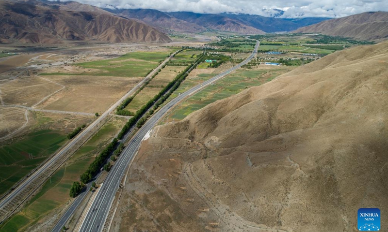 An aerial drone photo taken on June 27, 2024 shows a view of a high-grade highway linking Lhasa and Xigaze in southwest China's Xizang Autonomous Region. 