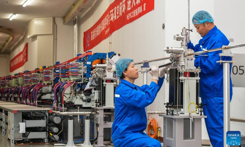 Staff members work at the High Energy Photon Source (HEPS) in Beijing, capital of China, June 30, 2024. Upon the completion of the vacuum circuit of its storage ring, the HEPS has entered the joint test stage on Monday. The HEPS is a major science infrastructure project built by the Institute of High Energy Physics under the Chinese Academy of Sciences.(Photo: Xinhua)