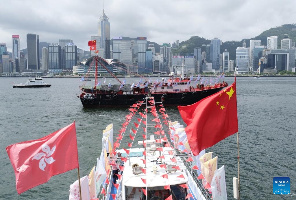 Fishing vessels take part in a cruise held by the Hong Kong Fishermen Consortium to celebrate the 27th anniversary of Hong Kong's return to the motherland at Victoria Harbour in Hong Kong, south China, July 1, 2024. (Photo: Xinhua)