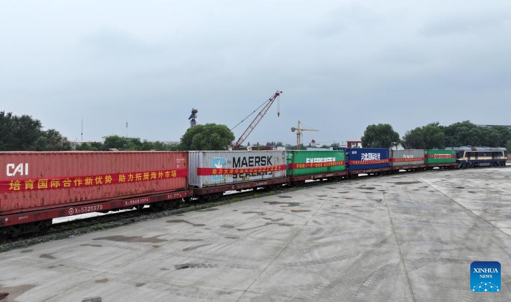 A drone photo taken on July 1, 2024 shows a China-Europe freight train bound for Moscow at Tianjin International Land Port in north China's Tianjin, July 1, 2024. A freight train bound for Moscow, Russia departed from Tianjin International Land Port on Monday, marking the launch of the land port's first China-Europe freight train route.(Photo: Xinhua)