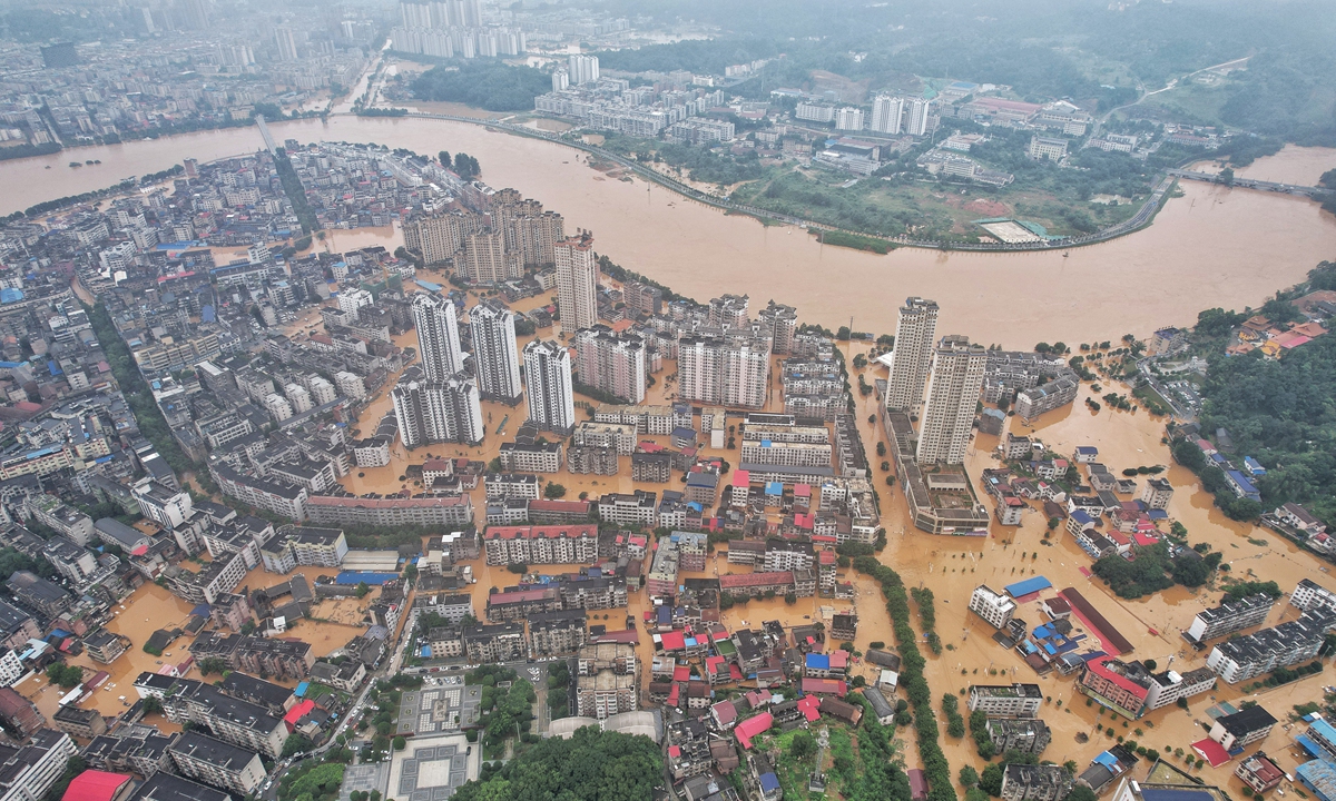 The county of Pingjiang in Yueyang, Central China's Hunan Province is suffering from severe flooding. Photo: VCG