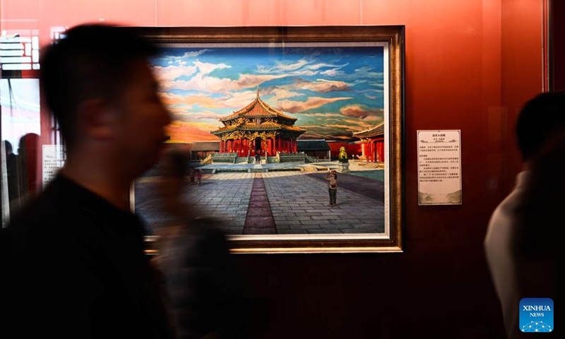 People view a painting exhibition at the Shenyang Palace Museum in Shenyang, northeast China's Liaoning Province, July 2, 2024. A series of exhibitions were held at Shenyang Palace Museum to celebrate the 20th anniversary of its inscription on the World Heritage List. (Photo: Xinhua)