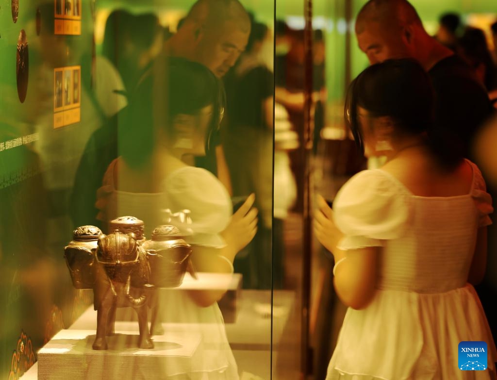 Tourists visit an exhibition featuring restored relics at the Shenyang Palace Museum in Shenyang, northeast China's Liaoning Province, July 2, 2024. A series of exhibitions were held at Shenyang Palace Museum to celebrate the 20th anniversary of its inscription on the World Heritage List. (Photo: Xinhua)