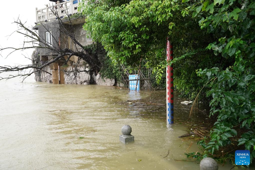 This photo taken on July 2, 2024 shows the submerged trail at a hydrological station located at the confluence of the Poyang Lake and the Yangtze River in Hukou County, east China's Jiangxi Province. The water level at Xingzi hydrological station of the Poyang Lake had reached 21.29 meters at 8 p.m. Tuesday, 2.29 meters above the alert mark. (Photo: Xinhua)