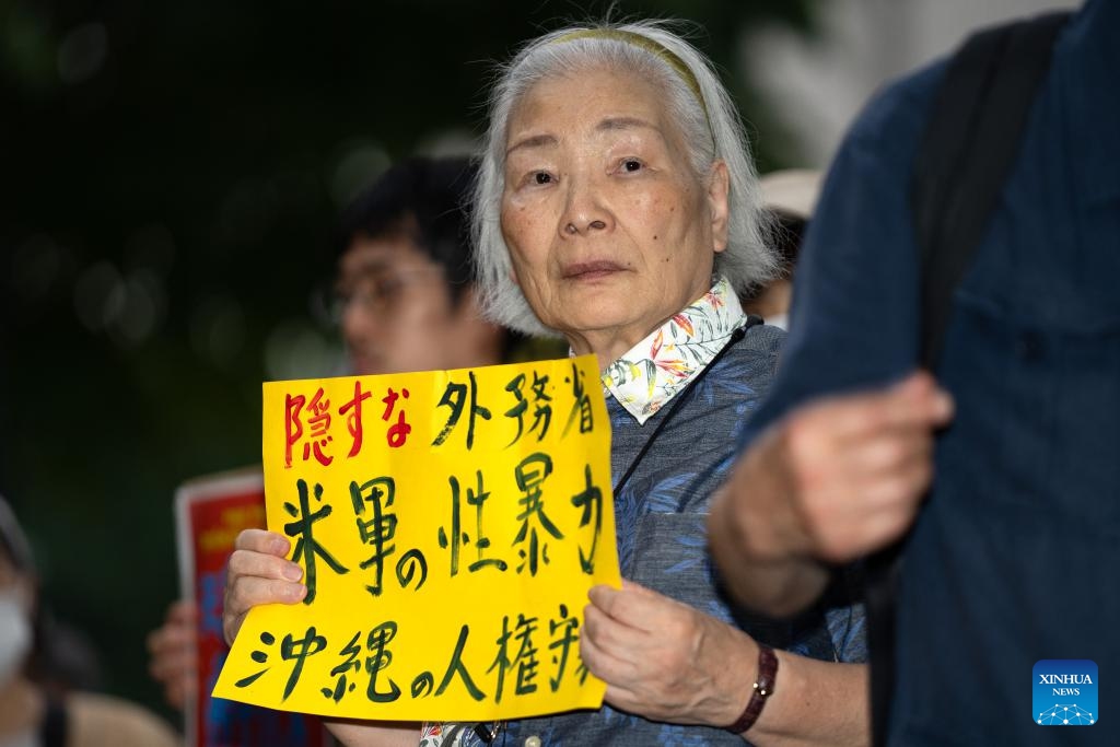 People gather in front of the country's Ministry of Foreign Affairs to protest against the Japanese government for concealing the alleged sexual assault cases involving U.S. military personnel in Japan from the public in Tokyo, Japan, July 2, 2024. (Photo: Xinhua)