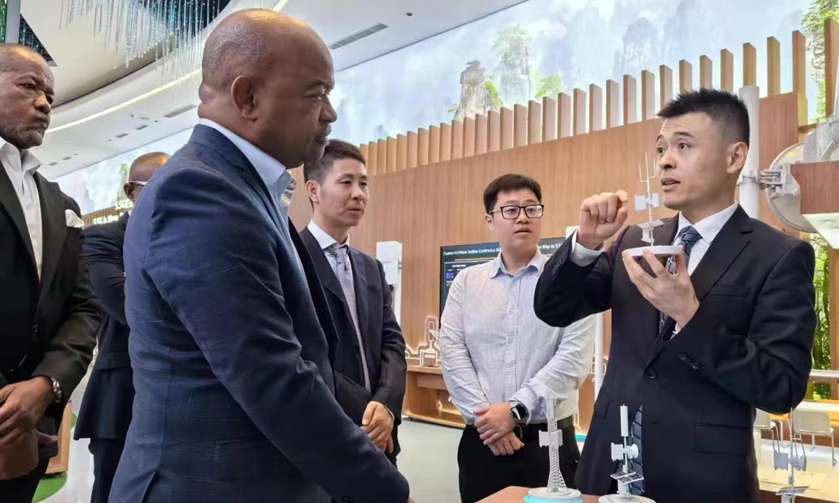 Mário Augusto da Silva Oliveira, Angola's Minister of Telecommunications, Information Technologies and Social Communication (second from left) during a visit to China in late June Photo: Courtesy of the Angolan Embassy in Beijing